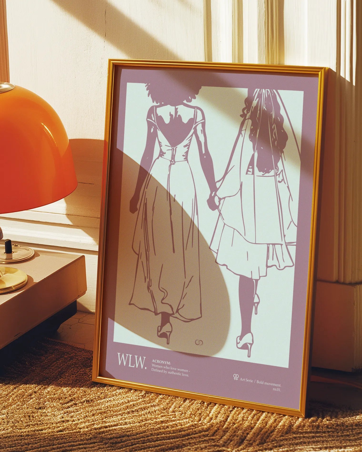 A print with an illustrated couple holding hands, with additional text about WLW - women who love women.