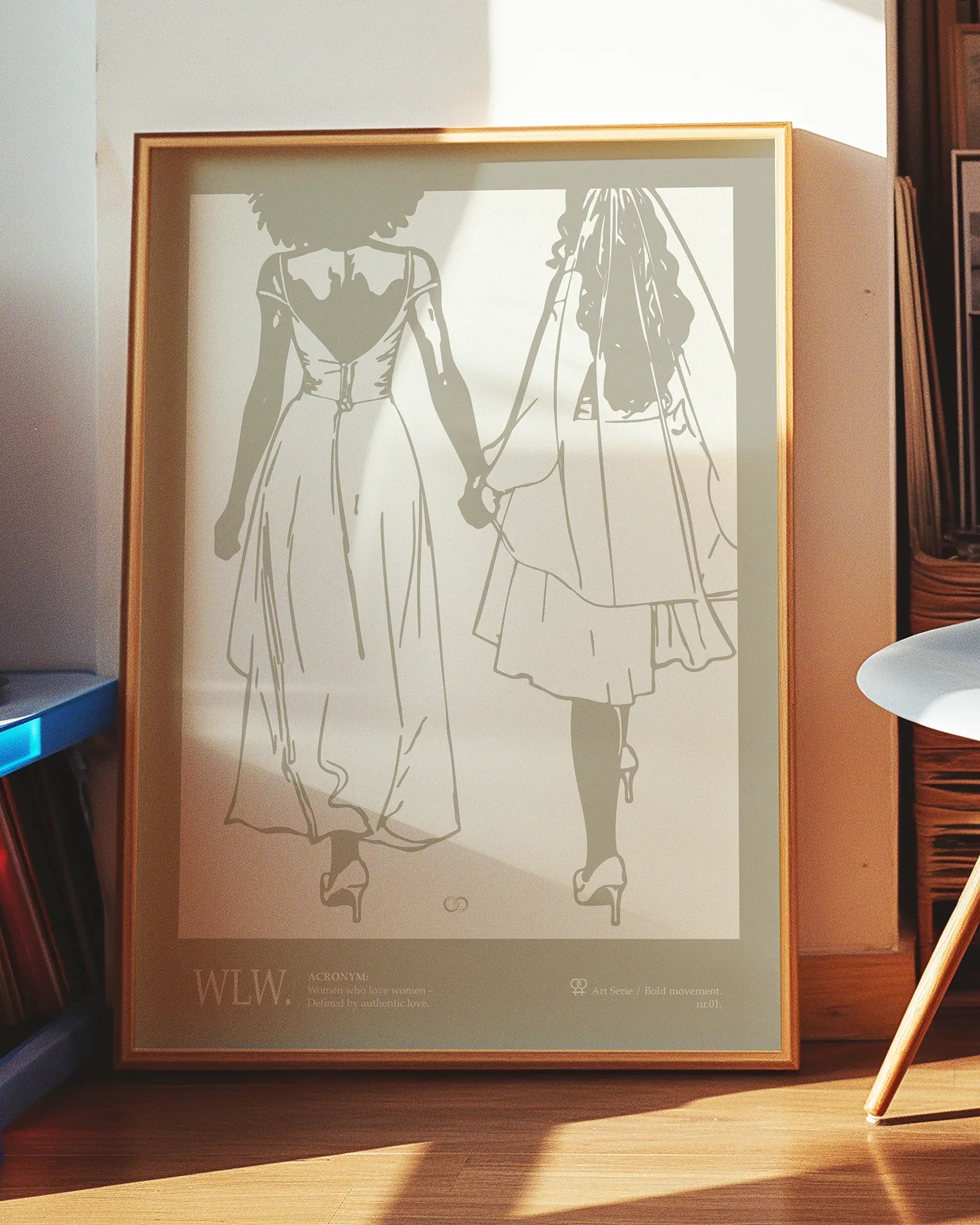 A print with an illustrated couple holding hands, with additional text about WLW - women who love women.