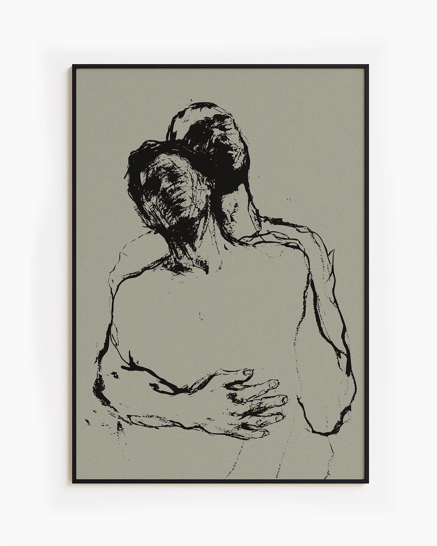 A framed poster with two, sketched gay men embracing in a dramatic pose.