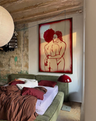 The poster depicts two naked, black women in a romantic pose.