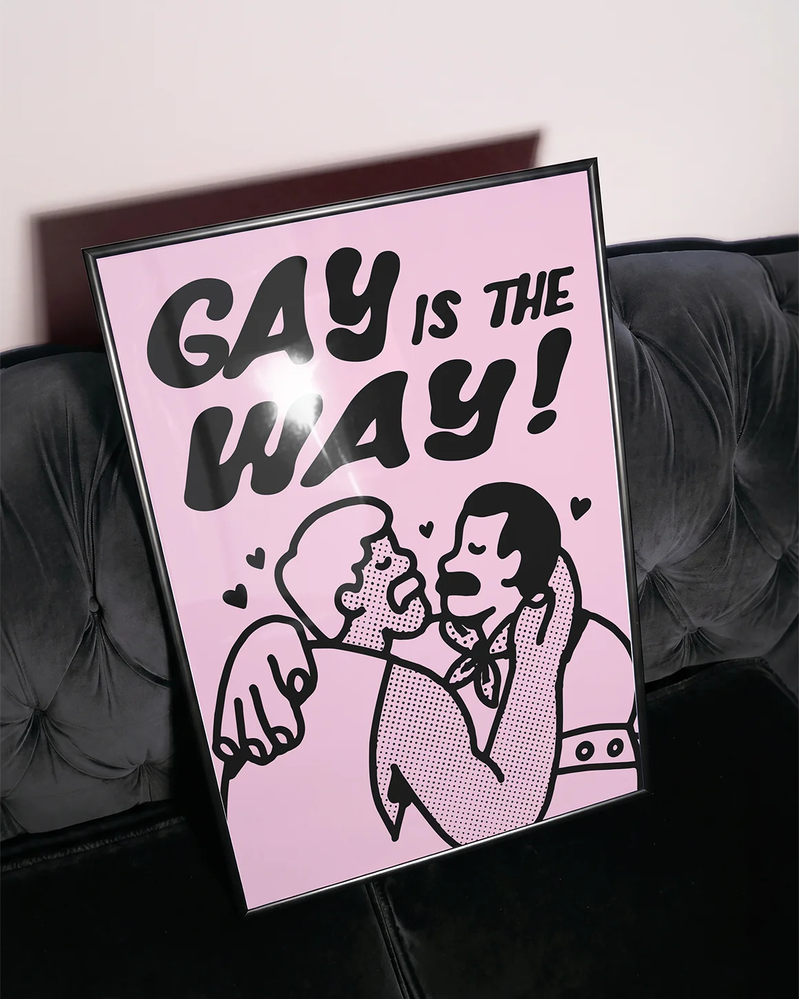 A poster with two gay men kissing with the text 'GAY IS THE WAY!'