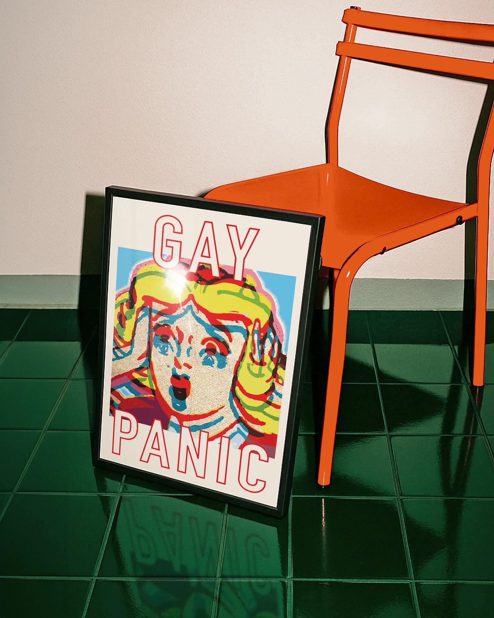 A framed poster featuring a screaming woman in pop art style with the text: *"GAY PANIC"* in red.