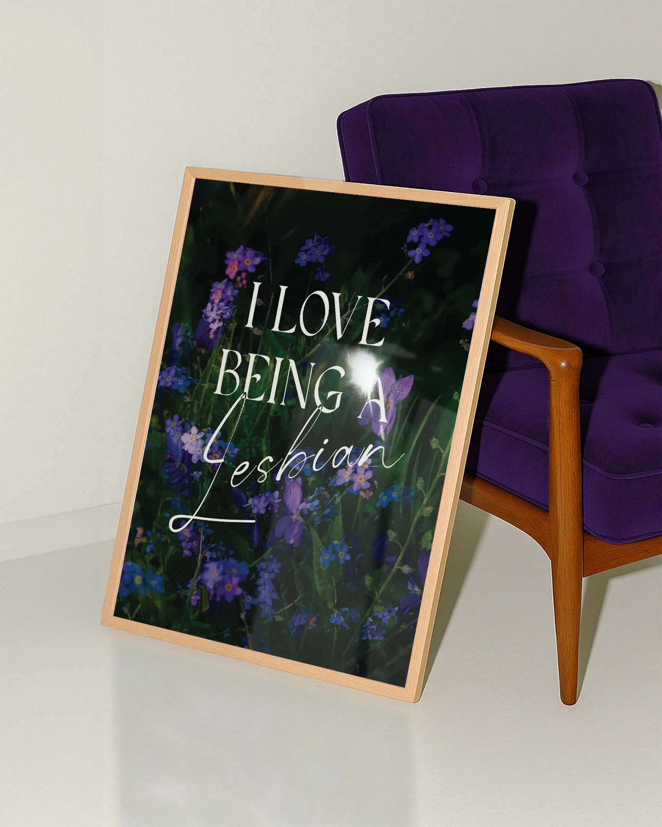 A poster of violets with the text 'I LOVE BEING A LESBIAN'.