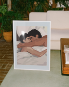 A romantic gay poster of two men slumbering in a bed.