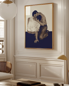 A poster with two men kissing on the floor.