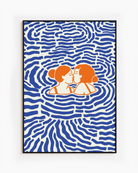 A lesbian poster with two women kissing in the ocean.