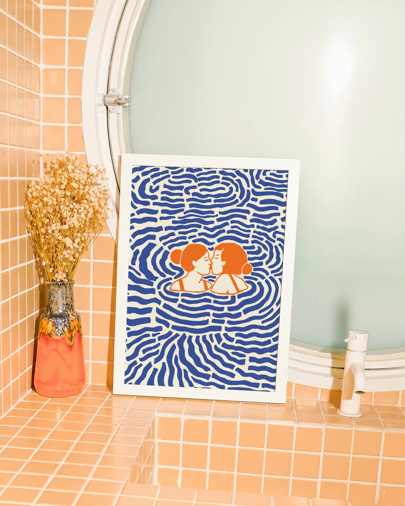 A lesbian poster with two women kissing in the ocean.