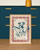 A framed poster featuring two cowgirls riding a horse, surrounded by a retro-style floral frame.