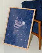 A poster with two gay men hugging each other in a dark blue lake.