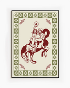 A framed poster with two, naked cowgirls riding a horse.