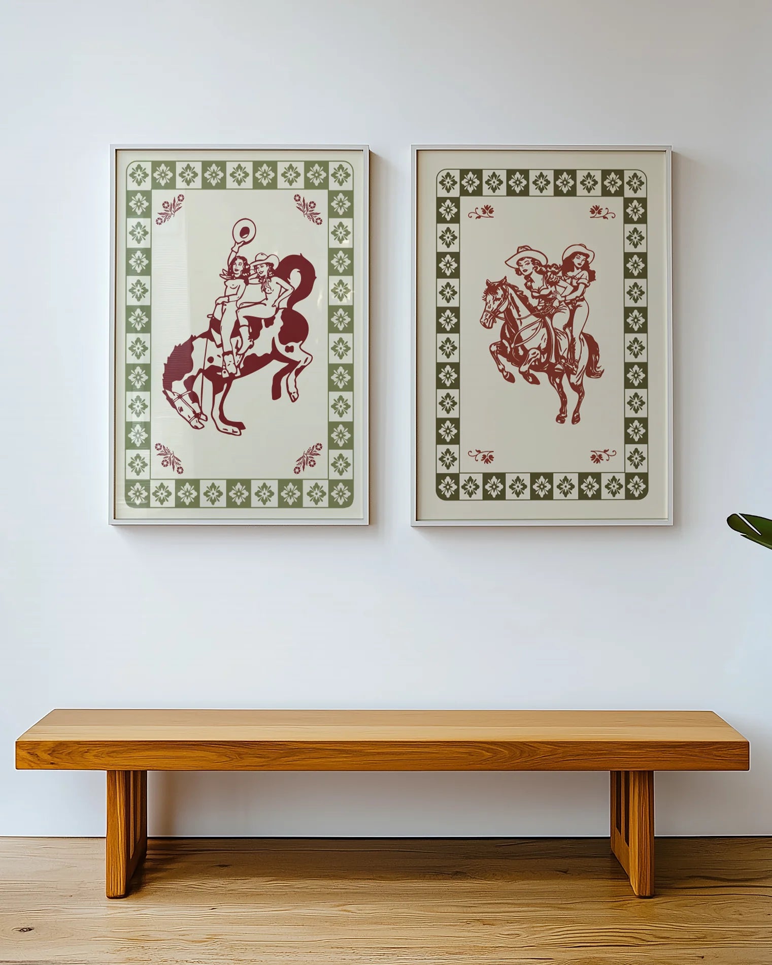 A framed poster with two, naked cowgirls riding a horse.