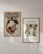 A framed poster featuring a female boxer completely dominating the ring, knocking down her male opponent, with the texts: “POWER & PUNCH”, “OUTBOXED”, “FINAL”, and “THE PATRIARCH PUNISHER.”