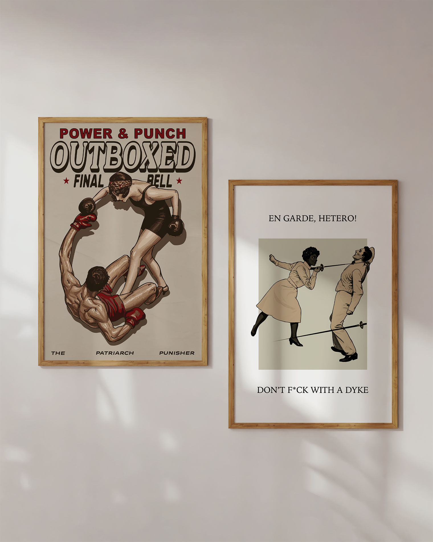 A framed poster featuring a female boxer completely dominating the ring, knocking down her male opponent, with the texts: “POWER & PUNCH”, “OUTBOXED”, “FINAL”, and “THE PATRIARCH PUNISHER.”