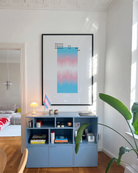 A poster with a gradient transgender pride flag and the text: 'Proud to be me'.