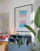 A poster with a gradient transgender pride flag and the text: 'Proud to be me'.