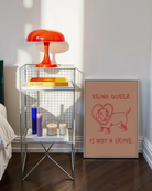 A poster with an illustrated dog, with the text 'BEING QUEER IS NOT A CRIME".