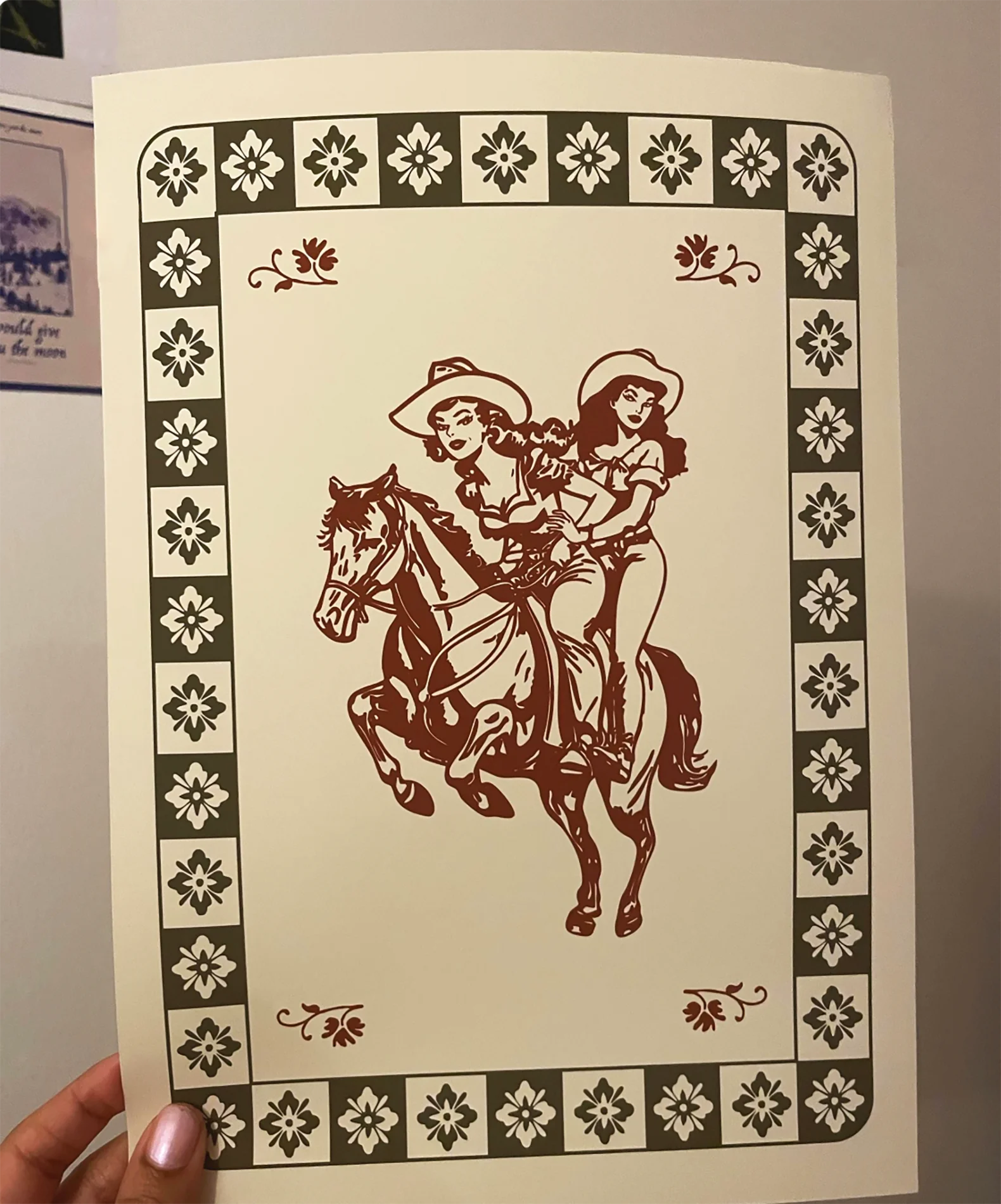 A review image from customer holding a poster.