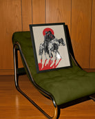 A poster with two riding cowboys, kissing.