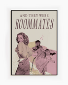 A framed poster depicting a woman lying in bed, and another woman undressing to join her — with the text “AND THEY WERE ROOMMATES.”