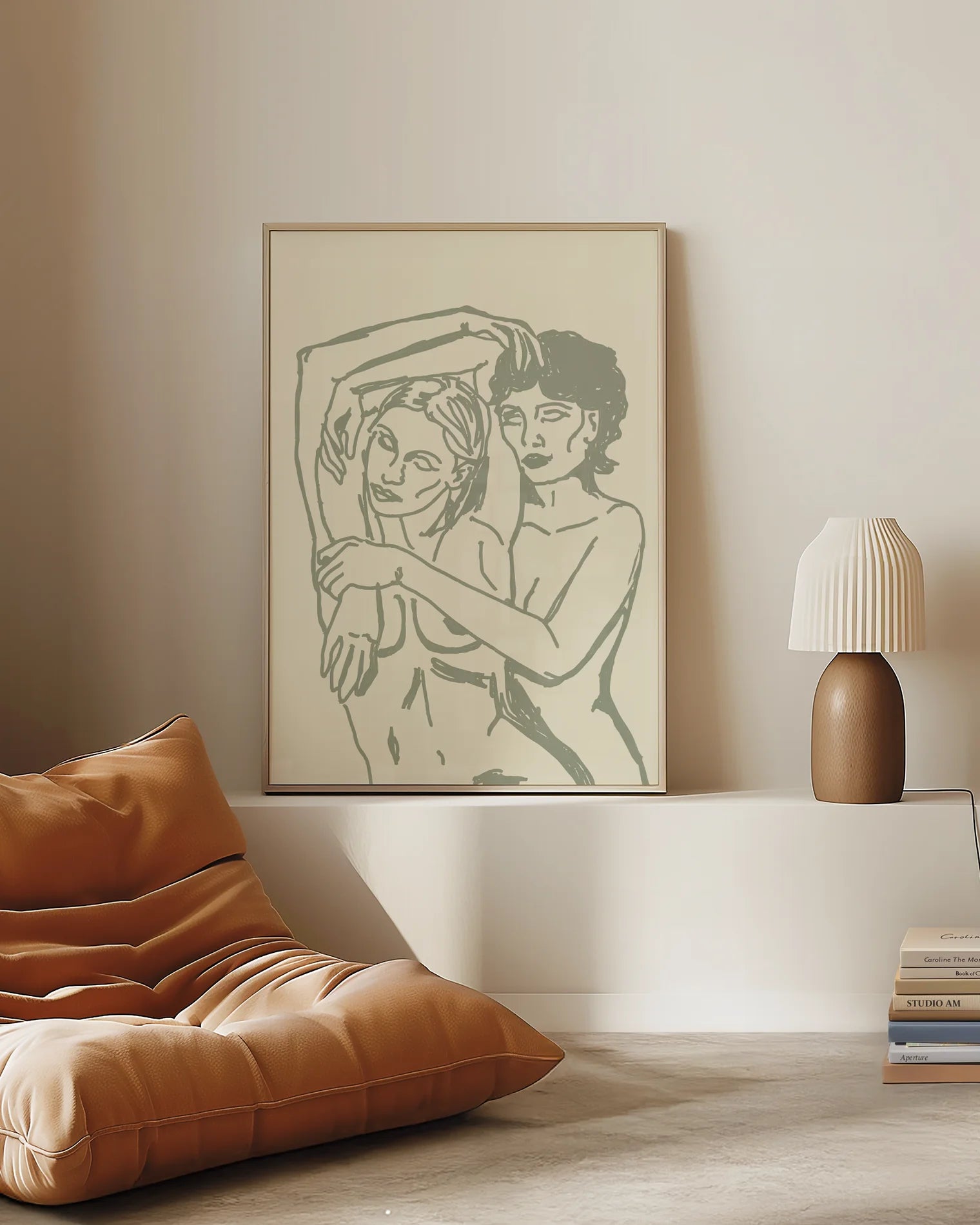 Postern föreställer ett två nakna kvinnor i en kram, i linjär och minimalistisk stil.