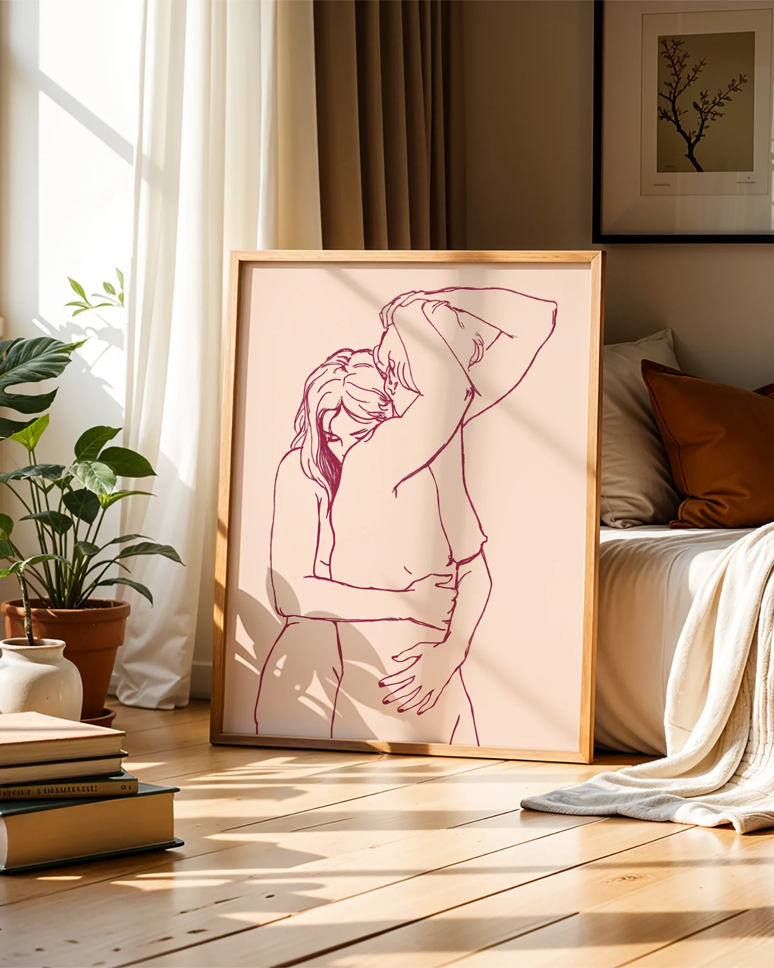 A framed print with two lesbian, naked girls hugging.