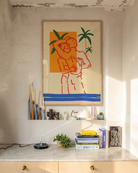 An abstract gay poster of two men hugging at the beach.