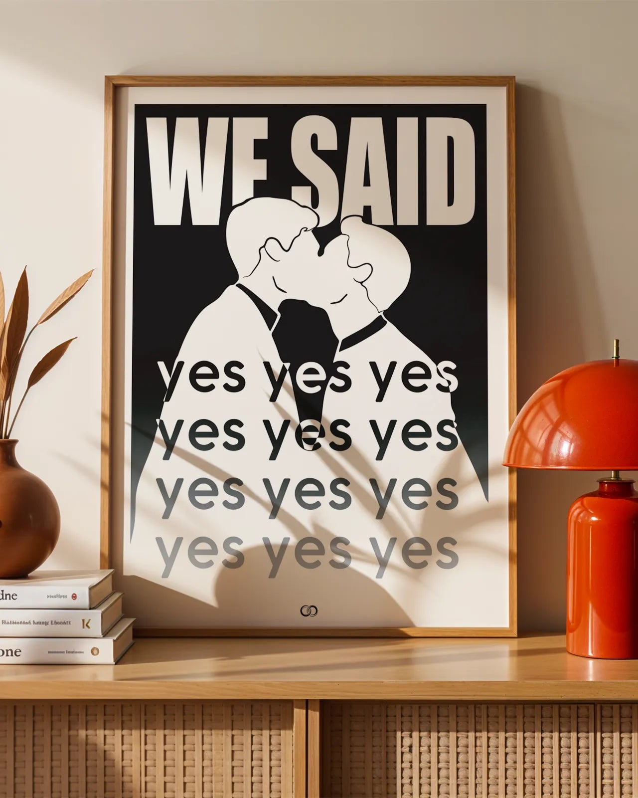 A poster with a silhouette of two men kissing with the text 'We said yes yes yes'.