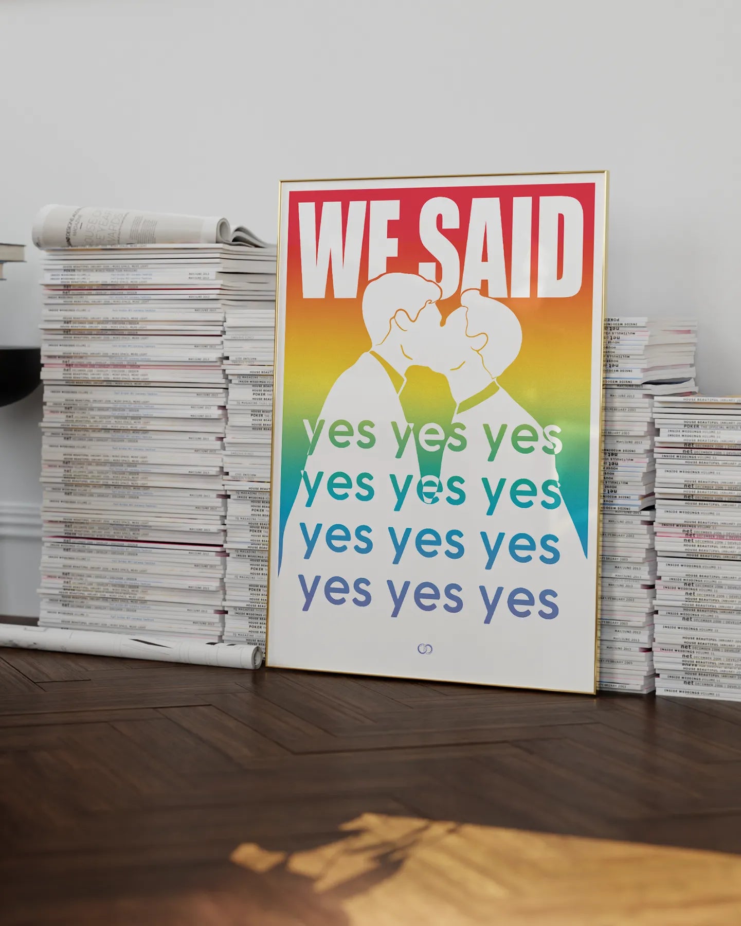 A poster with a silhouette of two men kissing with the text 'We said yes yes yes'.