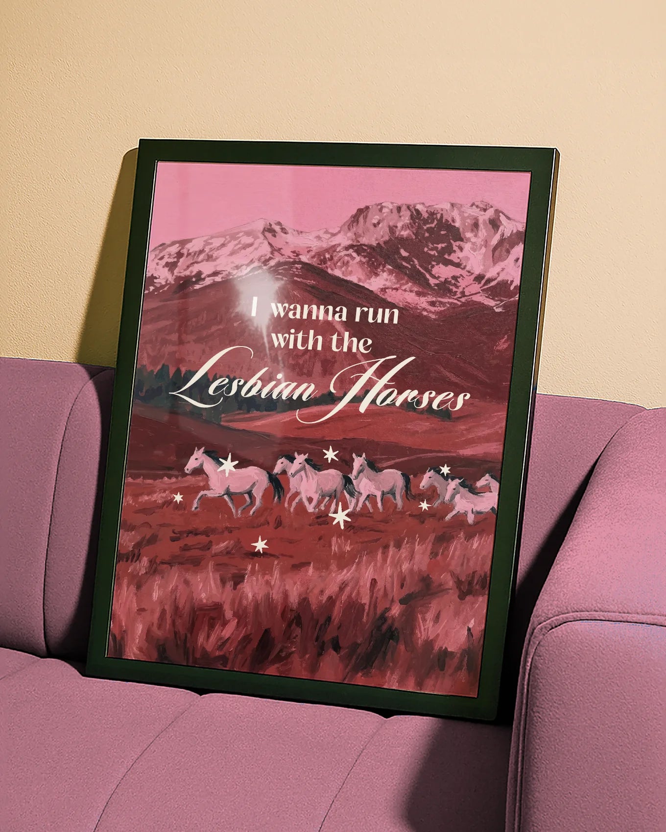 A poster with seven white horses running on an open field, with the text 'I wanna run with the lesbian horses'.